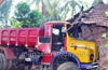 Woman injured as lorry rams against house near Thokkottu